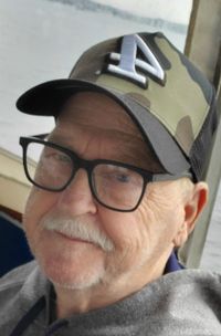 Charles \"Chuck\" Holland