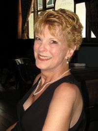 Kristine \"Kris\" Budelman